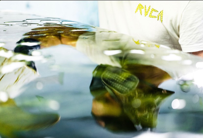 Abstract resin tint on a surfboard